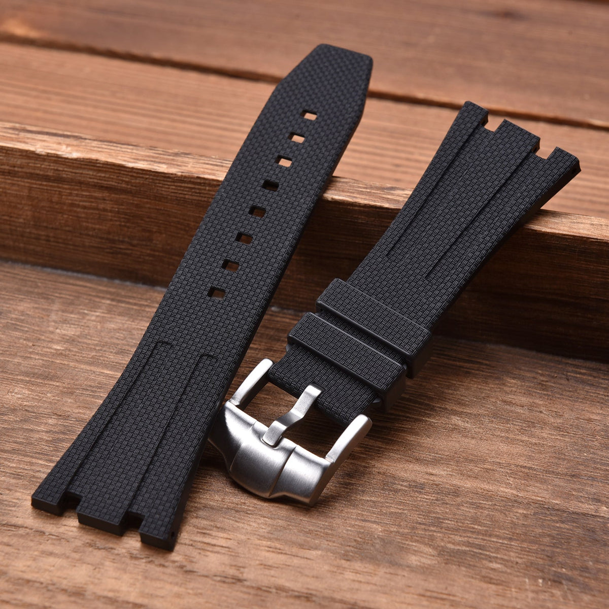 Rubber strap and case for AP x Swatch Black KronoKeeper – strap on wood background